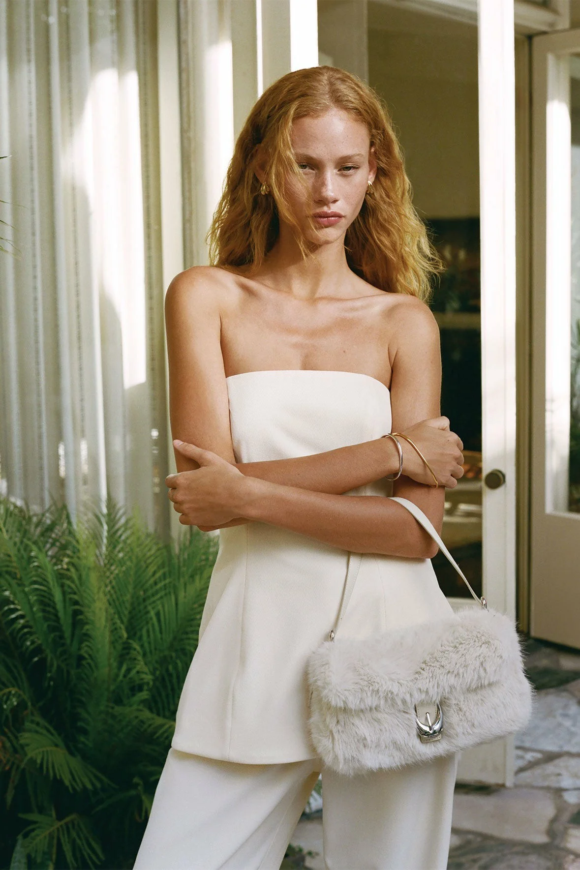 Effortless Elegance: The Timeless Appeal of a White Wrap Top